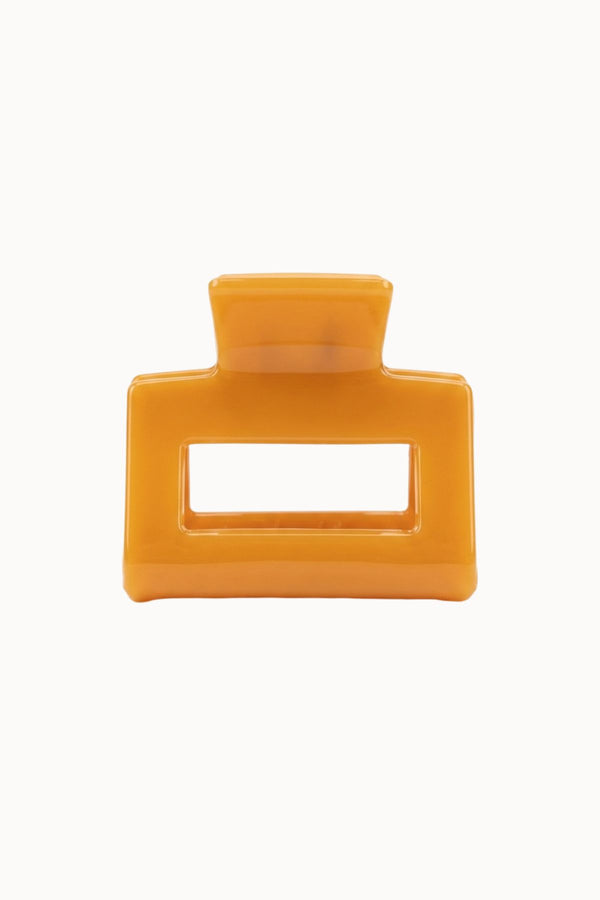 PINCE À CHEVEUX ORANGE